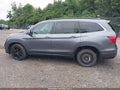 2021 Honda Pilot — photo 15 of 17 | VIN 5FNYF6H24MB003050
