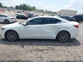 2015 Acura TLX — photo 14 of 16 | VIN 19UUB2F32FA000577