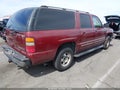 2003 Chevrolet Suburban 1500 — photo 4 of 16 | VIN 1GNFK16Z93J177698