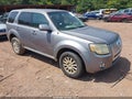 2008 Mercury Mariner — photo 1 of 16 | VIN 4M2CU87188KJ41178