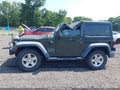2015 Jeep Wrangler — photo 14 of 16 | VIN 1C4AJWAGXFL588819