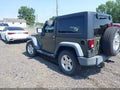 2015 Jeep Wrangler — photo 3 of 16 | VIN 1C4AJWAGXFL588819