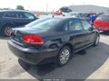 2013 Volkswagen Passat — photo 4 of 16 | VIN 1VWAP7A33DC073138