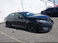 2013 Kia Optima — photo 14 of 17 | VIN 5XXGR4A61DG204311