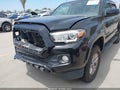 2018 Toyota Tacoma — photo 15 of 20 | VIN 3TMAZ5CN8JM061626