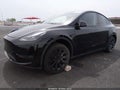 2025 Tesla Model Y — photo 2 of 13 | VIN 7SAYGDED4SF319846