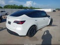 2022 Tesla Model Y — photo 4 of 18 | VIN 7SAYGDEEXNF385847
