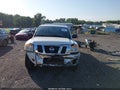 2011 Nissan Titan — photo 13 of 17 | VIN 1N6BA0EK6BN316568