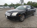 2009 Mercury Sable — photo 2 of 21 | VIN 1MEHM42W59G632978