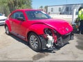 2014 Volkswagen Beetle — photo 1 of 18 | VIN 3VWFP7AT0EM600798