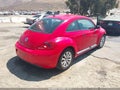 2014 Volkswagen Beetle — photo 4 of 18 | VIN 3VWFP7AT0EM600798