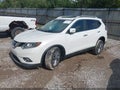 2015 Nissan Rogue — photo 2 of 12 | VIN 5N1AT2MV5FC756987