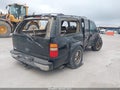2003 Chevrolet Suburban 1500 — photo 4 of 16 | VIN 3GNEC16Z33G132427