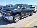 2018 Chevrolet Silverado 1500 — photo 2 of 16 | VIN 3GCUKSEC9JG224178