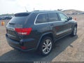 2013 Jeep Grand Cherokee — photo 4 of 17 | VIN 1C4RJFAT3DC646024