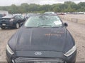 2014 Ford Fusion — photo 6 of 16 | VIN 3FA6P0HD9ER228508
