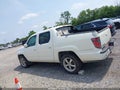2014 Honda Ridgeline — photo 14 of 18 | VIN 5FPYK1F57EB004827