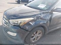 2014 Hyundai Santa Fe — photo 6 of 11 | VIN 5XYZU3LB8EG209580
