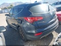 2014 Hyundai Santa Fe — photo 3 of 11 | VIN 5XYZU3LB8EG209580