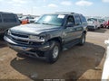 2002 Chevrolet Tahoe — photo 2 of 11 | VIN 1GNEC13T52R194748