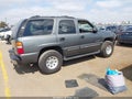 2002 Chevrolet Tahoe — photo 4 of 11 | VIN 1GNEC13T52R194748