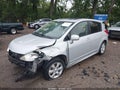 2009 Nissan Versa — photo 2 of 16 | VIN 3N1BC13E59L353690