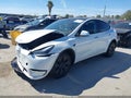 2024 Tesla Model Y — photo 2 of 16 | VIN 7SAYGDEE0RF177627