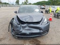 2023 Tesla Model Y — photo 11 of 15 | VIN 7SAYGDEF9PF648499