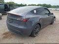 2023 Tesla Model Y — photo 4 of 15 | VIN 7SAYGDEF9PF648499
