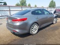 2016 Kia Optima — photo 4 of 17 | VIN 5XXGU4L33GG088969