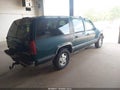 1995 Chevrolet Suburban — photo 4 of 16 | VIN 1GNFK16K7SJ377934