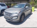 2015 Hyundai Santa Fe — photo 2 of 10 | VIN 5XYZU3LB2FG287371