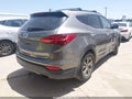 2015 Hyundai Santa Fe — photo 4 of 10 | VIN 5XYZU3LB2FG287371