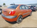 2009 Kia Rio — photo 4 of 16 | VIN KNADE223496497888