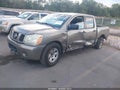 2006 Nissan Titan — photo 2 of 11 | VIN 1N6BA07A16N564141