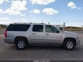 2009 GMC Yukon XL — photo 13 of 16 | VIN 1GKFC36069J108340