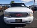 2005 GMC Yukon — photo 12 of 16 | VIN 1GKEK63U85J198477