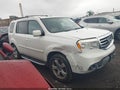 2015 Honda Pilot — photo 12 of 15 | VIN 5FNYF4H53FB033416