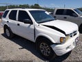 2004 Isuzu Rodeo — photo 1 of 16 | VIN 4S2CK58W344317058