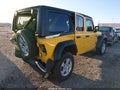 2021 Jeep Wrangler Unlimited — photo 4 of 17 | VIN 1C4HJXDN4MW648300