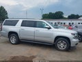 2017 Chevrolet Suburban — photo 13 of 17 | VIN 1GNSCHKCXHR235817