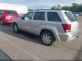 2009 Jeep Grand Cherokee — photo 3 of 11 | VIN 1J8HR58T19C544936