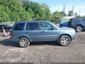 2005 Honda Pilot — photo 13 of 16 | VIN 5FNYF18445B025975