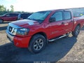 2010 Nissan Titan — photo 2 of 16 | VIN 1N6AA0EC6AN311812