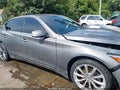 2014 Infiniti Q50 — photo 12 of 15 | VIN JN1BV7AR2EM706048