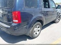 2012 Honda Pilot — photo 12 of 13 | VIN 5FNYF3H20CB039041