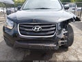 2011 Hyundai Santa Fe — photo 6 of 16 | VIN 5XYZG3AB2BG014578