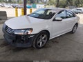 2014 Volkswagen Passat — photo 2 of 17 | VIN 1VWAT7A34EC040615