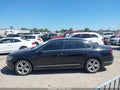 2014 Volkswagen Passat — photo 14 of 16 | VIN 1VWCN7A3XEC028665