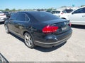 2014 Volkswagen Passat — photo 3 of 16 | VIN 1VWCN7A3XEC028665
